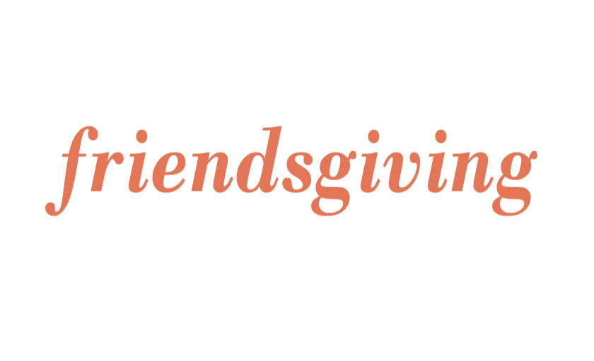 A white frame with orange lettering saying "friendsgiving".